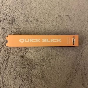 Quick Slick,  it’s like a baby hair tamer, to slick down the edges